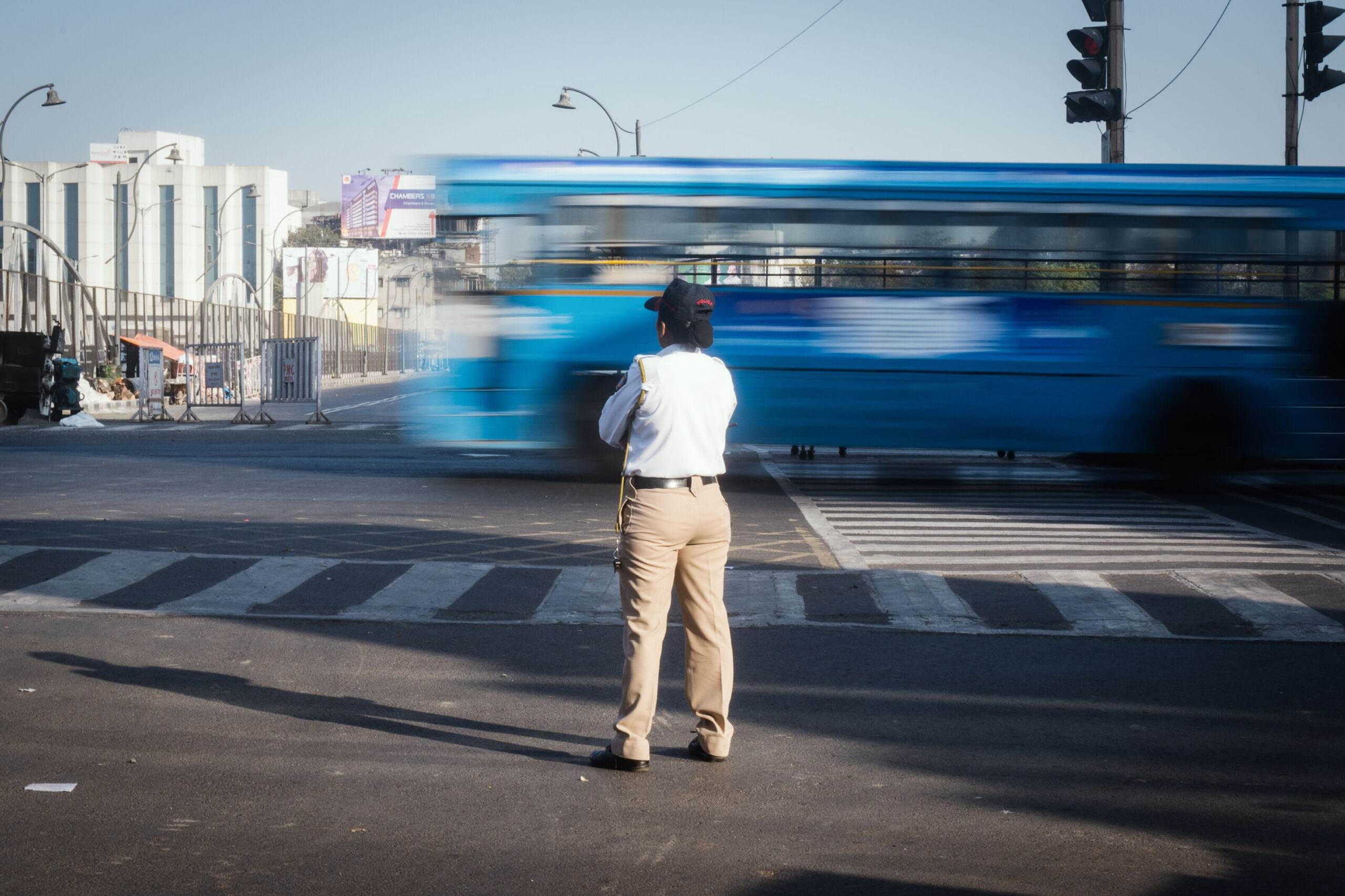 Mumbai traffic police checking vehicles for traffic violations and windshield visibility